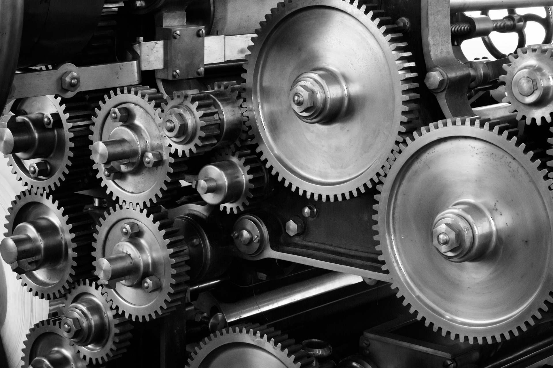 A photo of gears within an engine, published to: "4 Myths About Industry-Specific Digital Marketing Solutions"